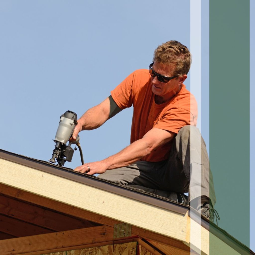 Roofing contractor at work