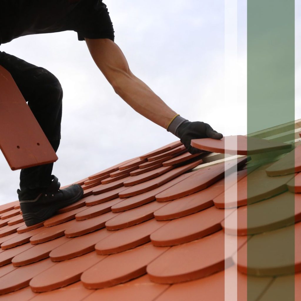 Roofing contractor at work