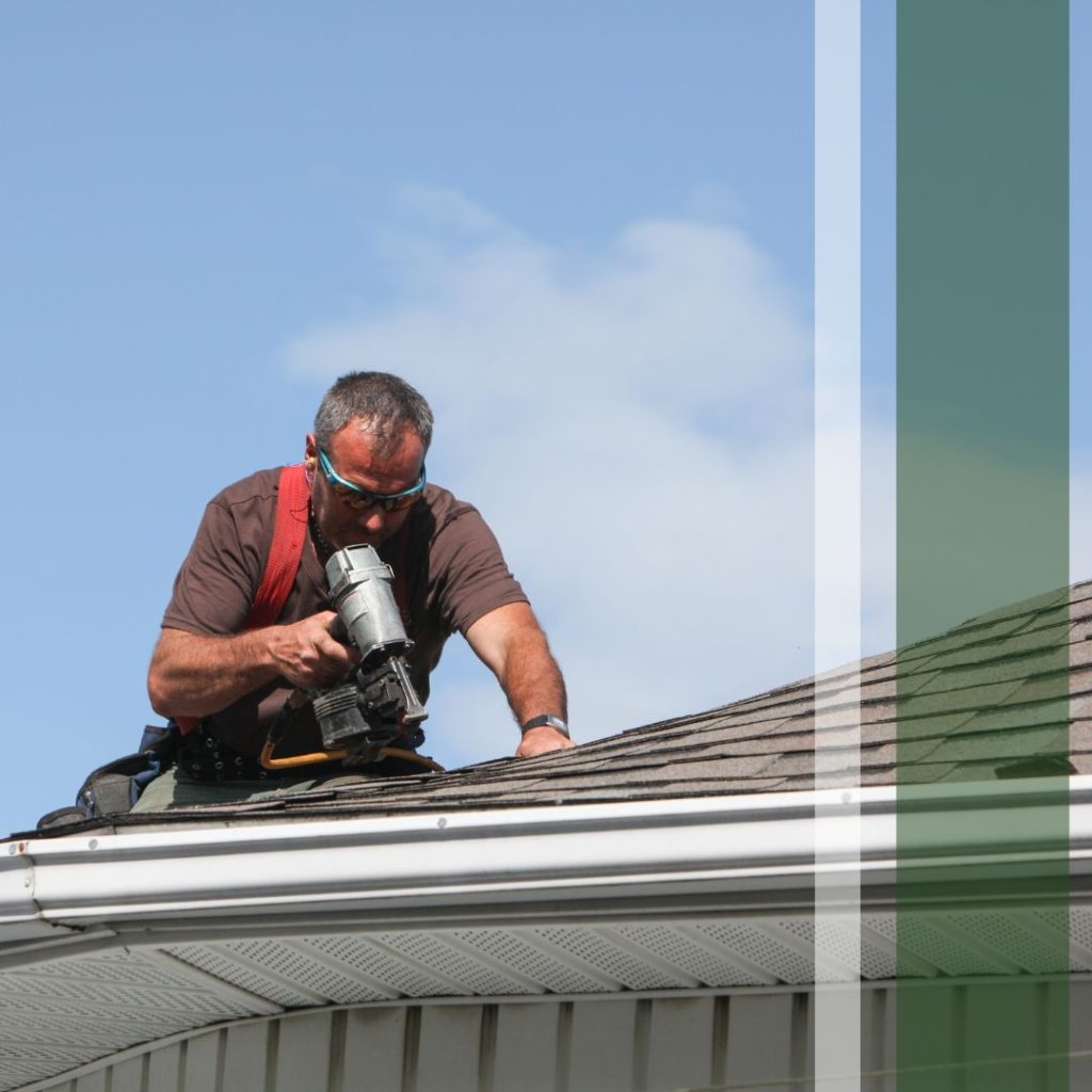 Roofing contractor at work