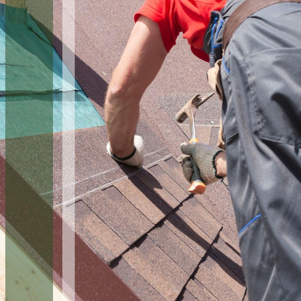 roofer nailing shingles